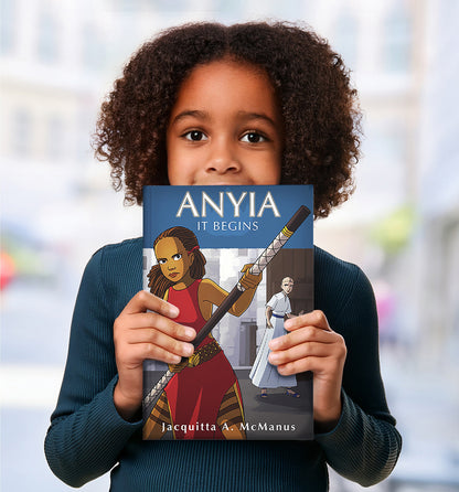 Child holding a middle grade fantasy book titled 'ANYIA IT BEGINS' by Jacquitta A. McManus 